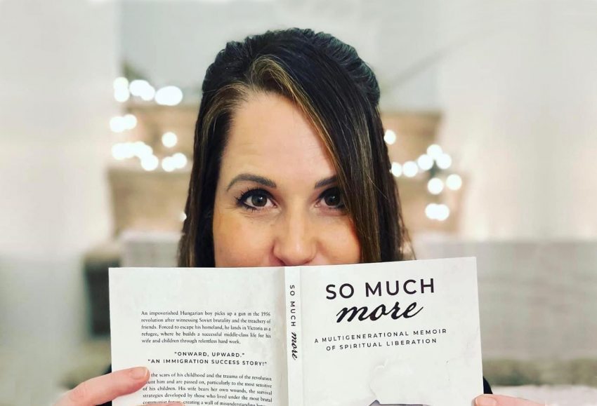 Cynthia Berényi with her book