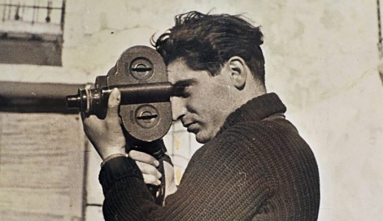 Robert Capa with his camera