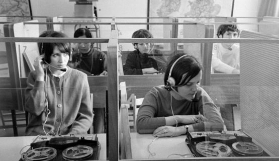 Young people in booths learning a foreign language in Budapest in 1971