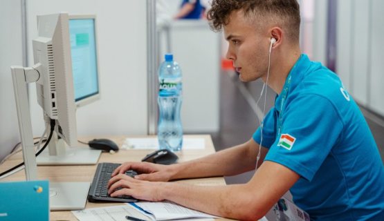 János Hidvégi working at his computer at the EuroSkills Competition