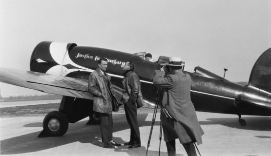 Navigator Sándor Magyar and pilot György Endresz preparing to fly across the Atlantic Ocean, with the camera is Antal Bánhidi, mechanical engineer, aircraft designer