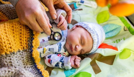 a baby being examined