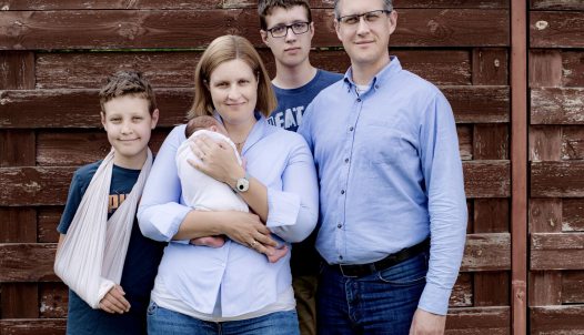 Noémi Somogyi-Adamis and Tamás Farkas Somogyi with their children