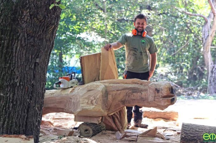 István Gáborecz with a wooden sculpture in the making