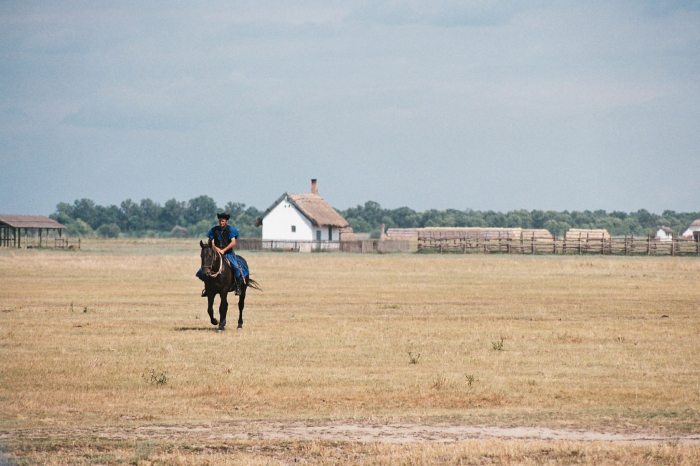 A man on horseback on the Great Plain