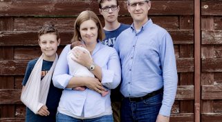 Noémi Somogyi-Adamis and Tamás Farkas Somogyi with their children