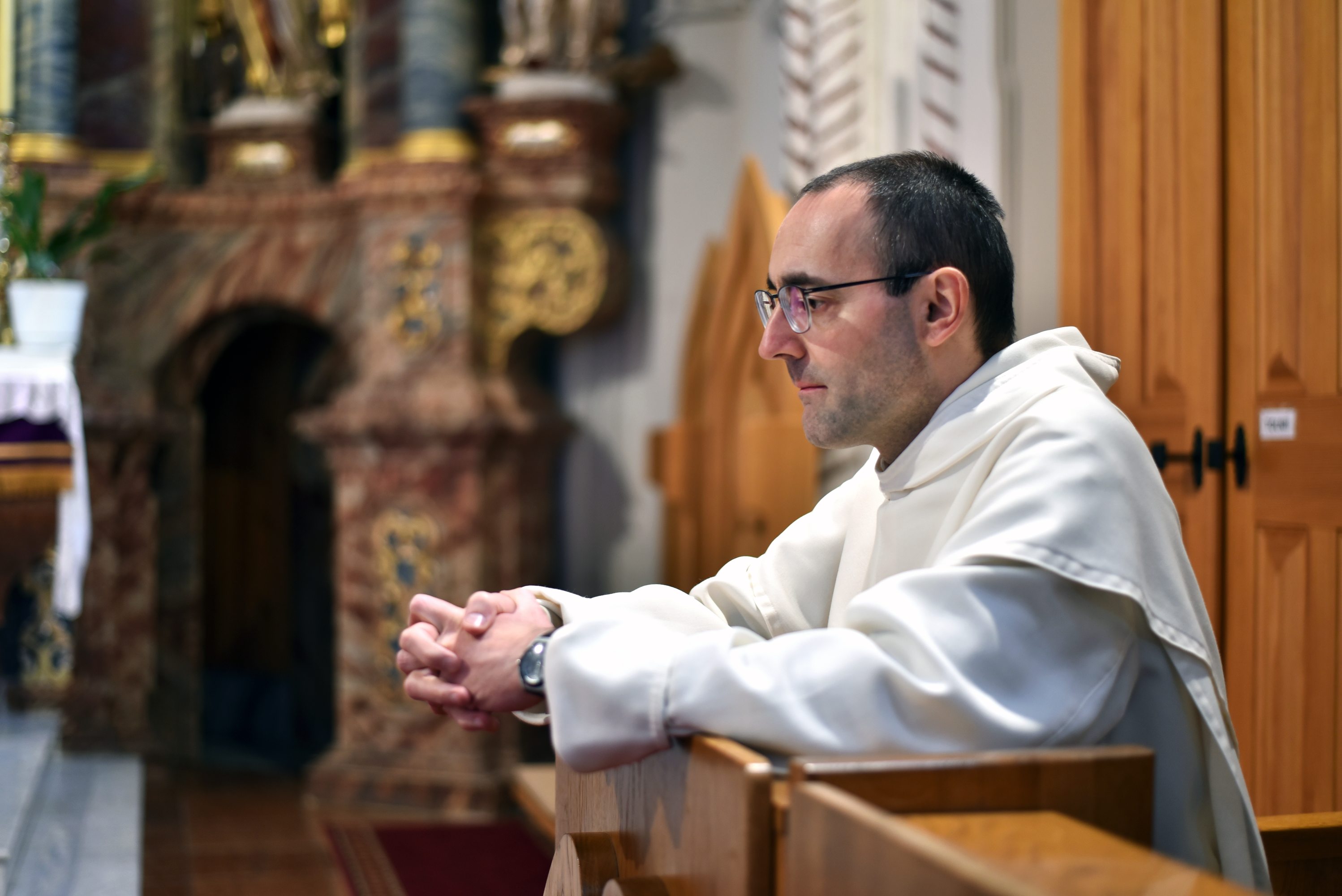 Pauline monk praying