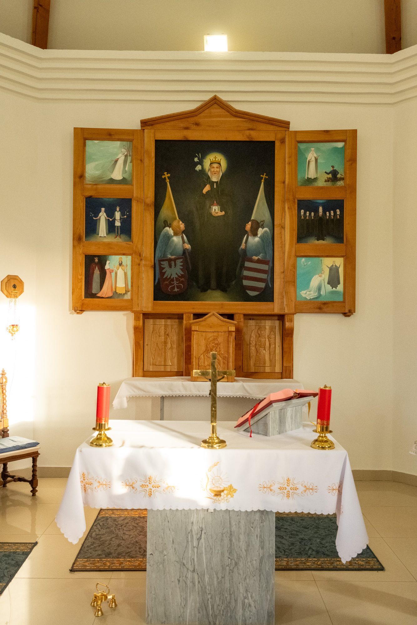 A winged altarpiece depicting the life of St Kinga