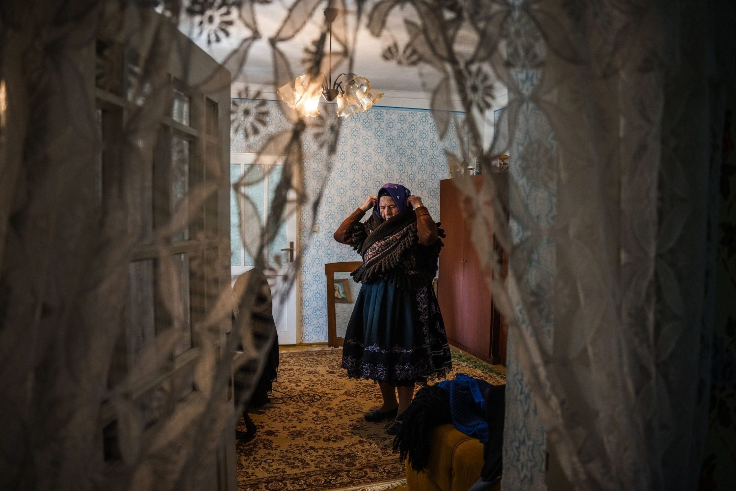 Old Swabian lady getting dressed