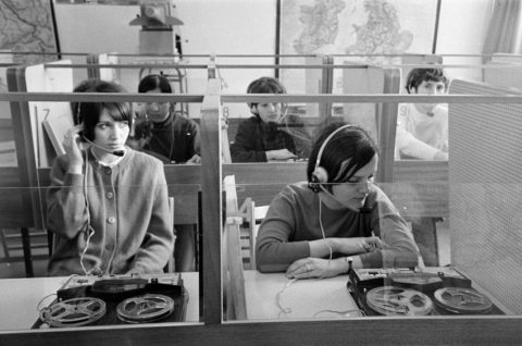 Young people in booths learning a foreign language in Budapest in 1971