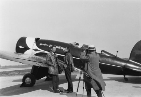 Navigator Sándor Magyar and pilot György Endresz preparing to fly across the Atlantic Ocean, with the camera is Antal Bánhidi, mechanical engineer, aircraft designer
