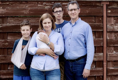 Noémi Somogyi-Adamis and Tamás Farkas Somogyi with their children